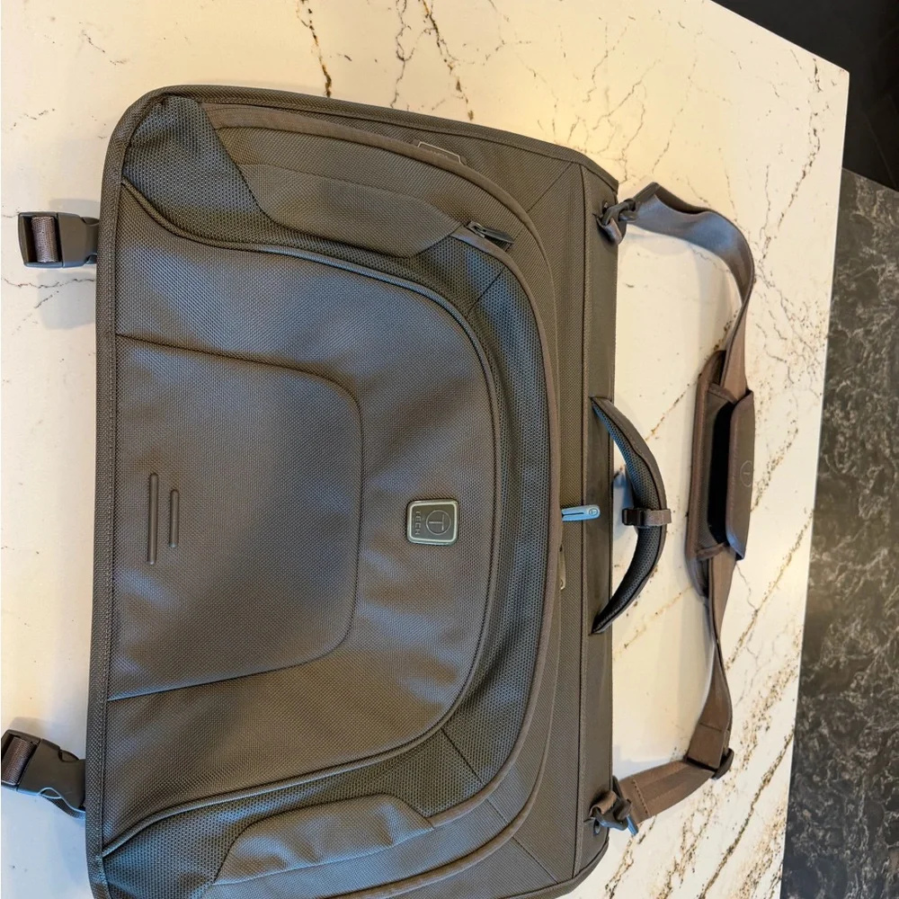 Tumi Brown Backpack with Multiple Compartments